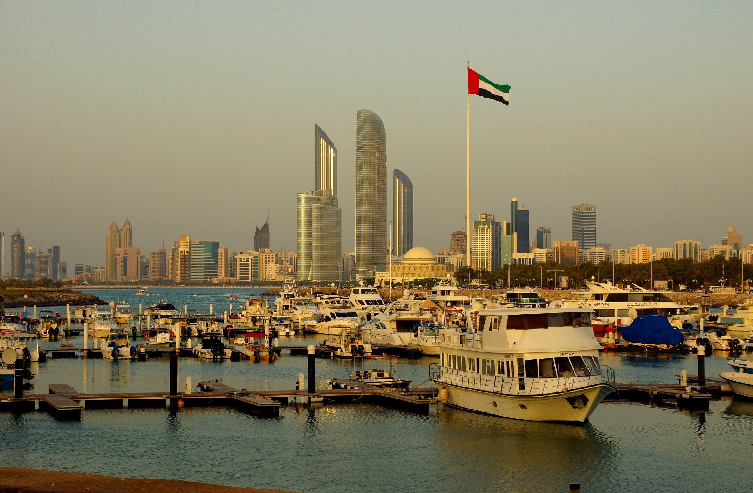 The Abu Dhabi skyline from Breakwater marina at dusk, Abu Dhabi