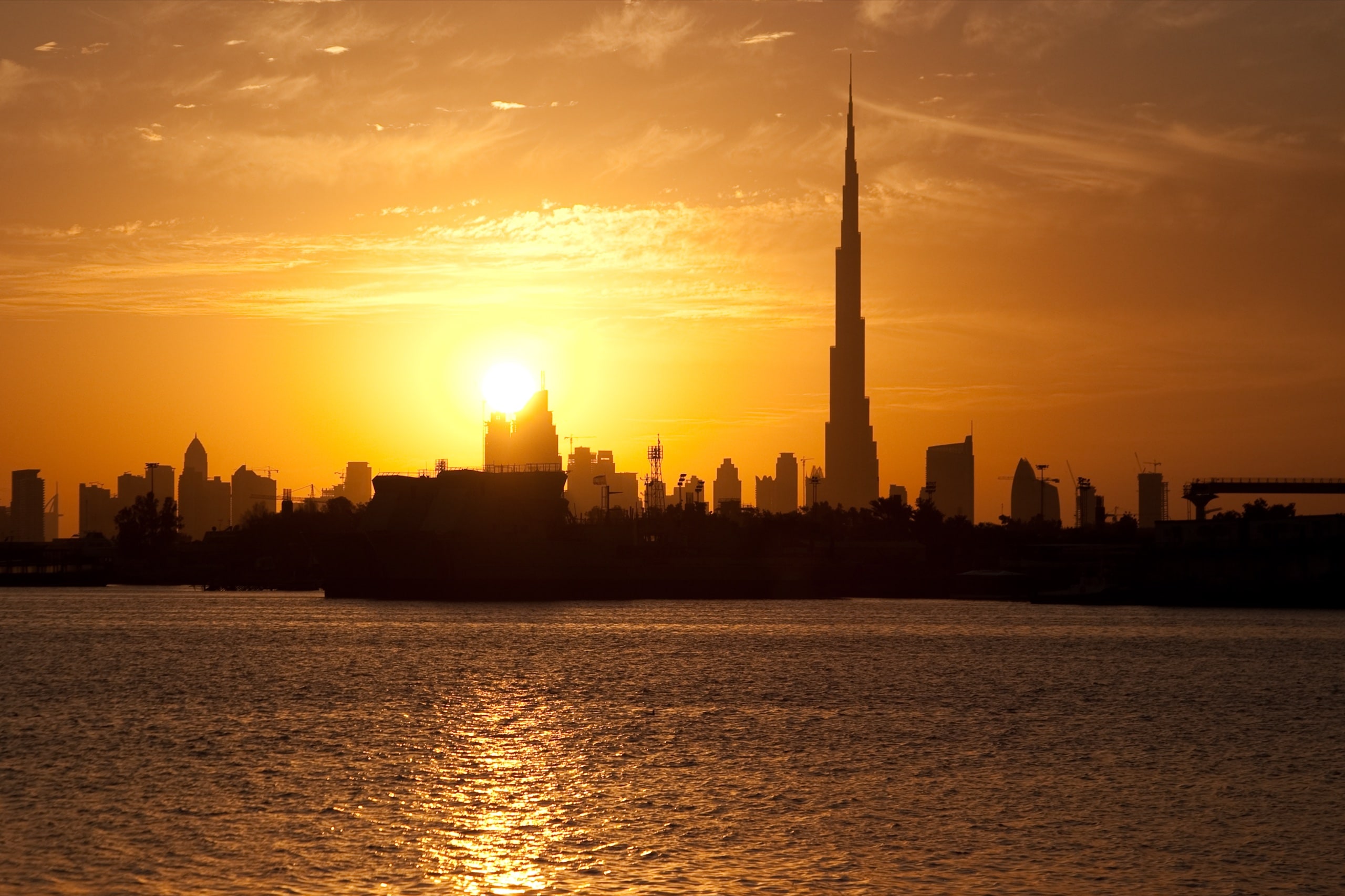 Downtown Dubai at sunset, seen from Festival City, Dubai